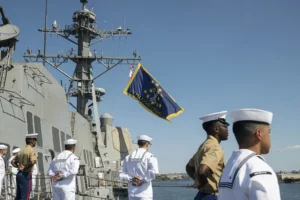 U.S. Navy and Marines aboard the Arleigh Burke-class guided missile destroyer USS Mustin (DDG 89)
