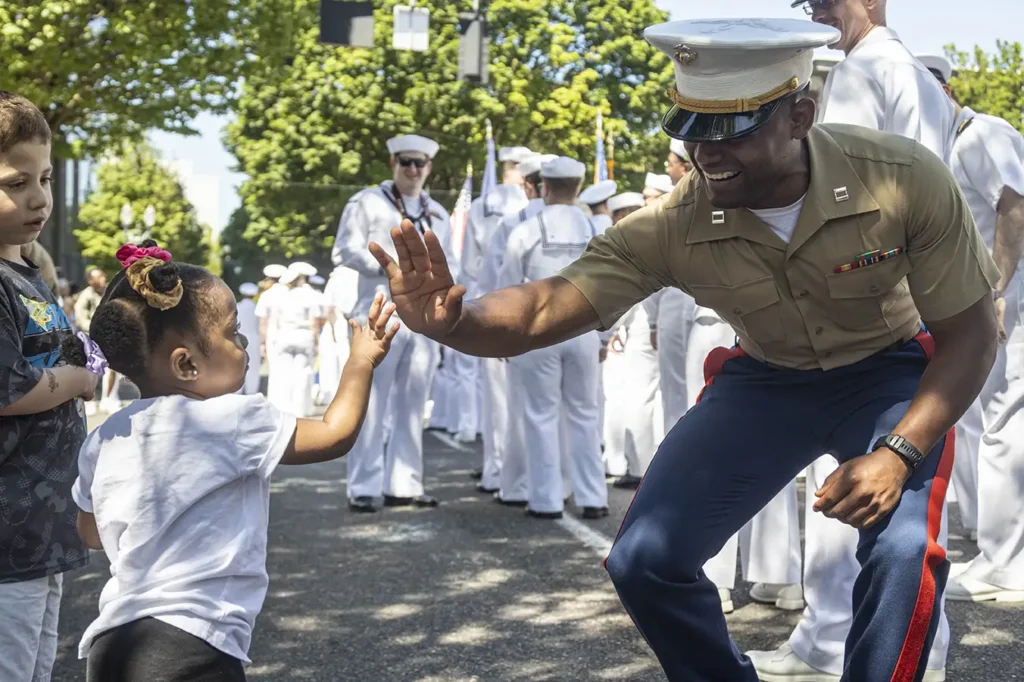citizens meet Sailors, Marines, and Coast Guardsmen